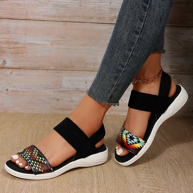 Sandalias de piel con punta abierta y tacón bajo