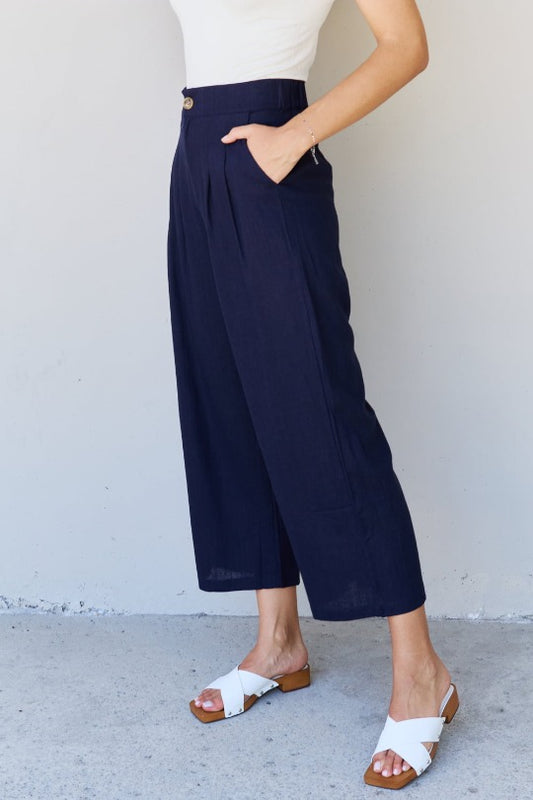 Pantalones de vestir de lino con detalle plisado