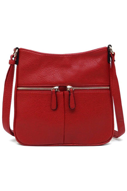 Bolso bandolera con cremallera y borlas en la parte delantera