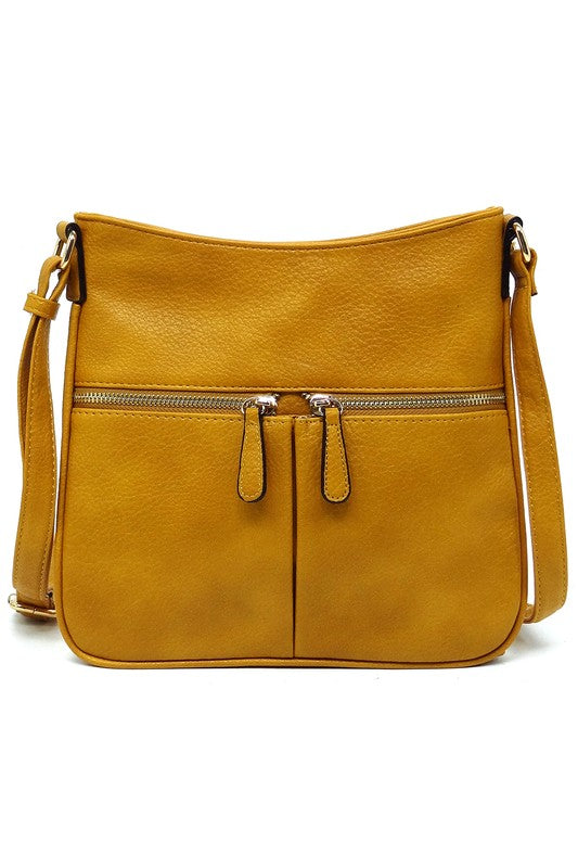 Bolso bandolera con cremallera y borlas en la parte delantera