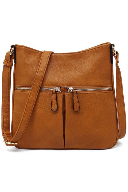 Bolso bandolera con cremallera y borlas en la parte delantera