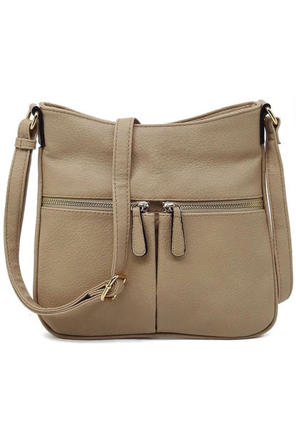 Bolso bandolera con cremallera y borlas en la parte delantera