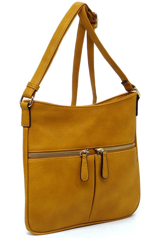 Bolso bandolera con cremallera y borlas en la parte delantera