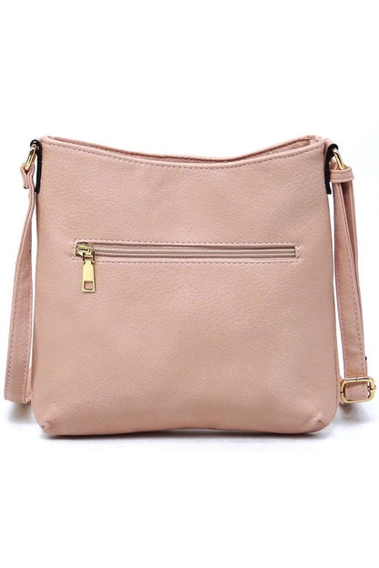Bolso bandolera con cremallera y borlas en la parte delantera